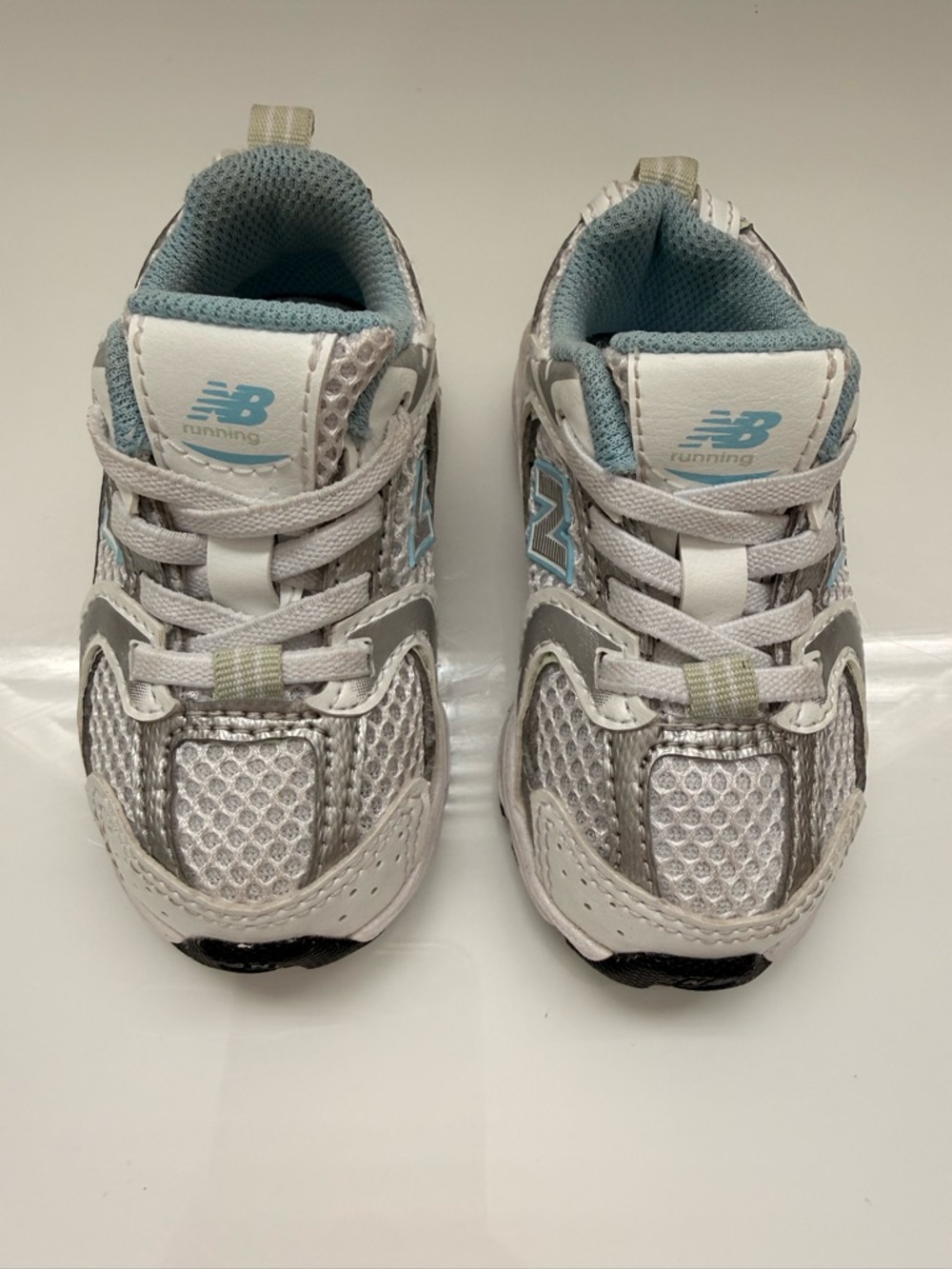 New Balance Kids Silver and Light Blue Athletic Sneakers size 4C